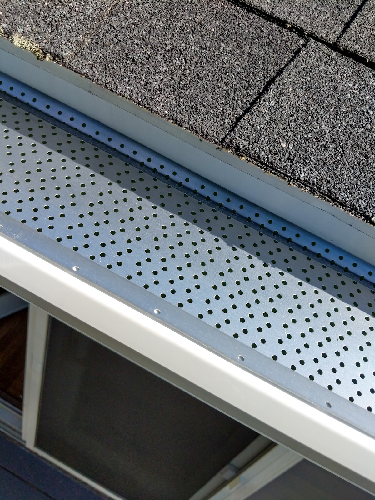 Closeup of gutters with leaf guard